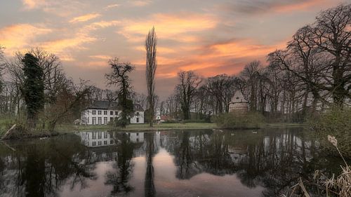 A stunning, dramatic sunset with early evening mist