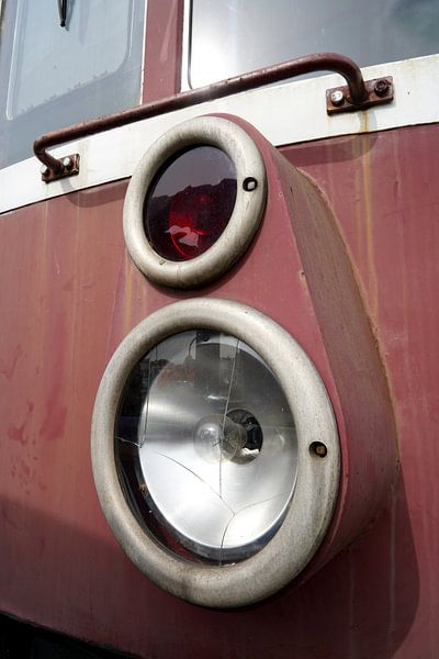 Headlight with bulb of an old decommissioned locomotive by Heiko Kueverling