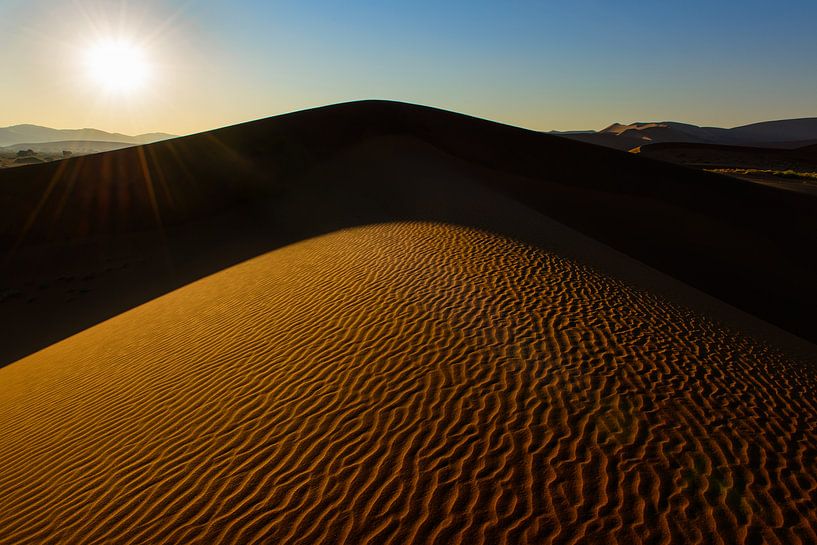 Dune rétro-éclairée par Denis Feiner