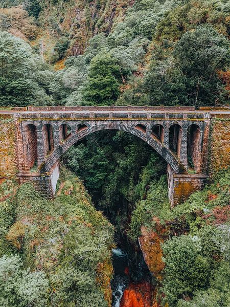 Old bridge on Madeira by Erik Lei