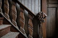 Ein Löwenkopf bewacht die Treppe