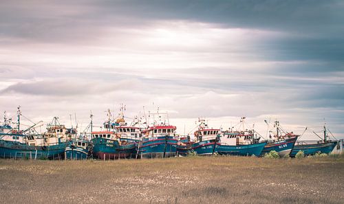 Scheepswrakken bij zonsondergang