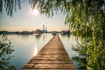 Landscape shot at the lake with wooden jetty and willow by Fotos by Jan Wehnert