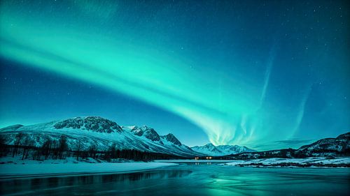 Noorderlicht boven een winterlandschap