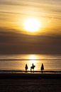 Paarden, strand en zonsondergang.. van Miranda van Hulst thumbnail