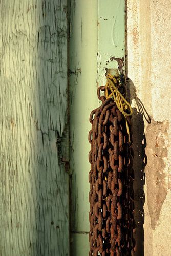 Rusty chains in the sunlight.