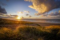 Plage et dune du coucher du soleil
