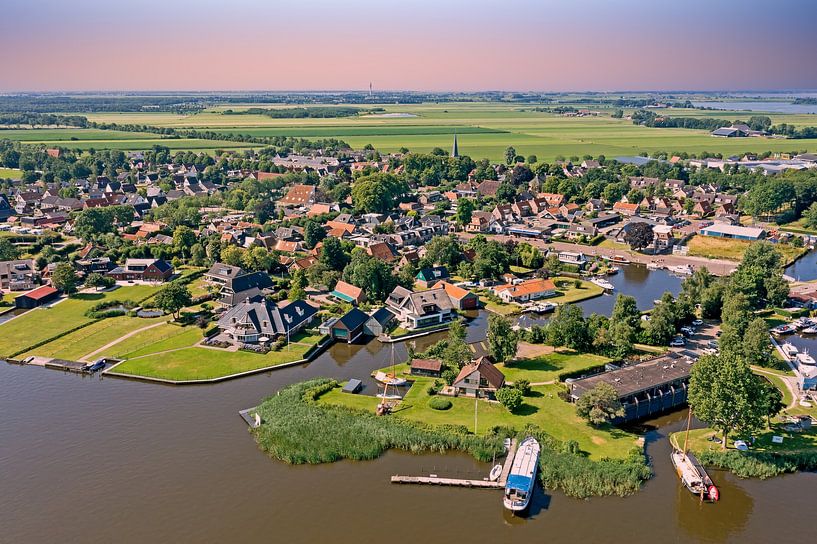 Aerial view of the village of Langweer in Friesland Netherlands at sunset by Eye on You