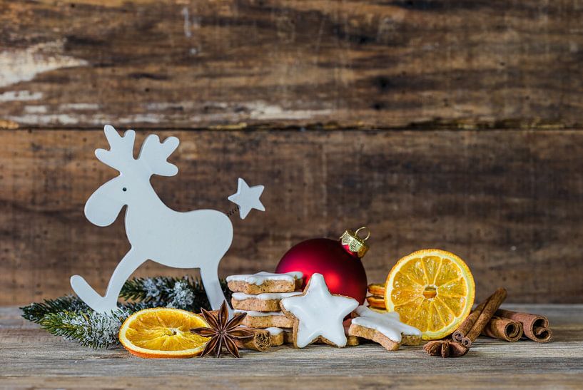 Christmas and Advent season still life decoration with reindeer, star shaped biscuits by Alex Winter