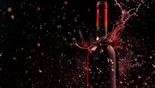 Red wine bottle splash panorama