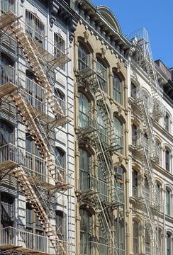 House facades with fire escapes by Achim Prill