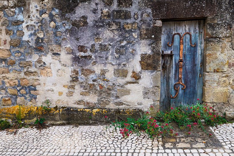 Beautiful colorful door in french mountain village with characteristic old wall by Francisca Snel