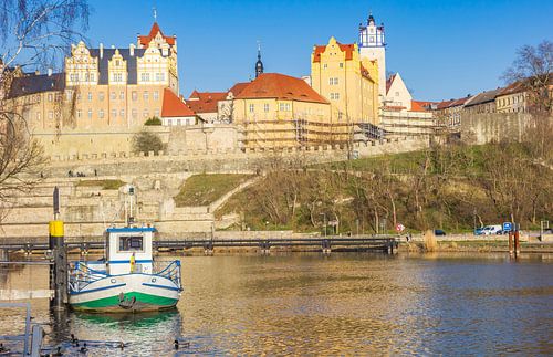 Boat on the Saale at the jetty in front of the castle in Bernburg