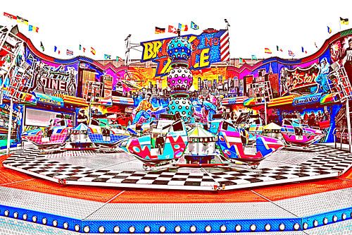 a colourful fairground carousel mixed media