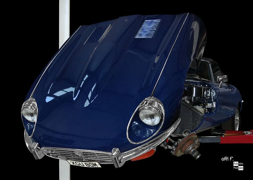 Jaguar E-Type Series 3 on lift by aRi F. Huber