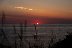 Sonnenuntergang mit Boot von Plinck Fotografie