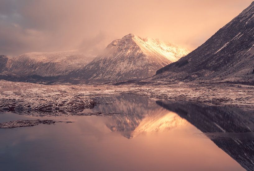 Reflections of mountains in the water on Lofoten Islands in Norway by Margreet Riedstra