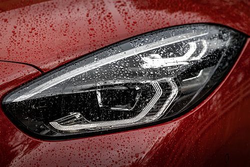 BMW Z4 koplamp in de regen