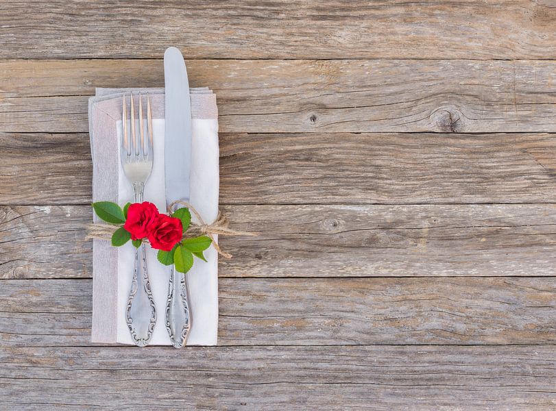 Valentines day or wedding table place setting with romantic rose flower by Alex Winter