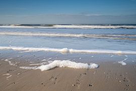 Foam on the beach by Richard Gilissen
