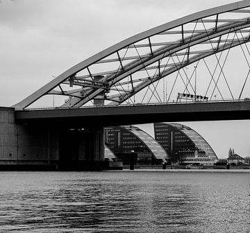 The Van Brienenoord Bridge with Salmon House in black and white by Zaankanteropavontuur