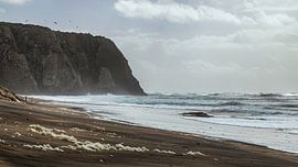 Atlantic coast near Colares, Portugal in severe stormy weather. by Marjolein Zijlstra