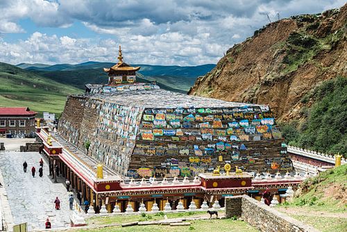 Stack of Mani stones at the Gyargo Ani Gompa near Tagong