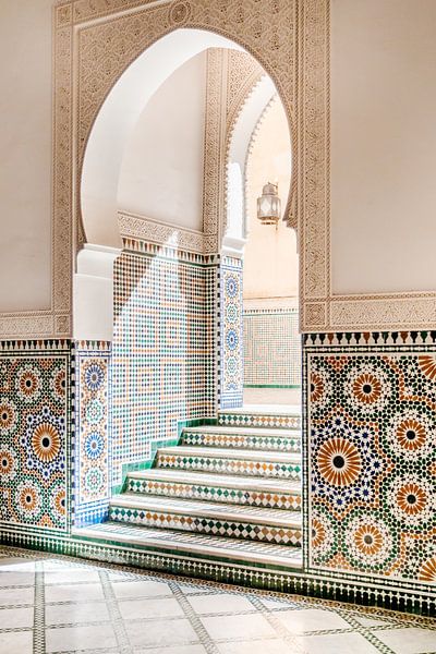 Mosaic-decorated walls and stairs in Moroccan mausoleum by Melissa Peltenburg