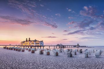 Beach of Sellin on Rügen with pier in the evening glow