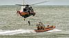 KNRM Reddingboot "Uly" en Belgische Sea King helicopter van Roel Ovinge thumbnail