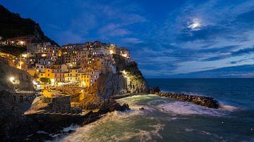 Manarola of the Cinque Terre in Italy at night with moon by Robert Ruidl