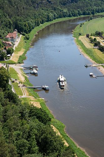Elbe river with steamboat and ferry in Rathen