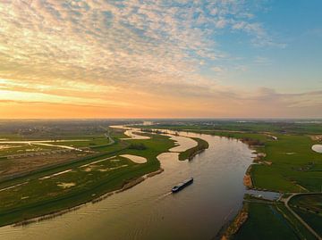 Ship sailing on the river IJssel during sunset from above by Sjoerd van der Wal Photography