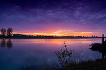 Sonnenuntergang auf dem Wasser von Geert den Tek