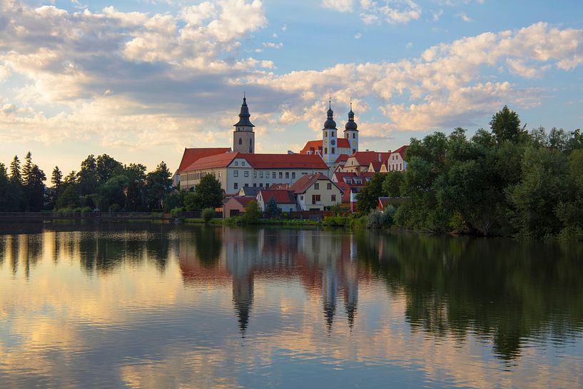 Our Lady Monastery over lake in Telc, Czech by Anton Eine