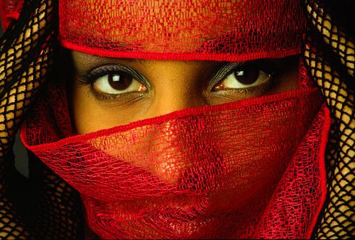 Oriental-looking veiled young woman