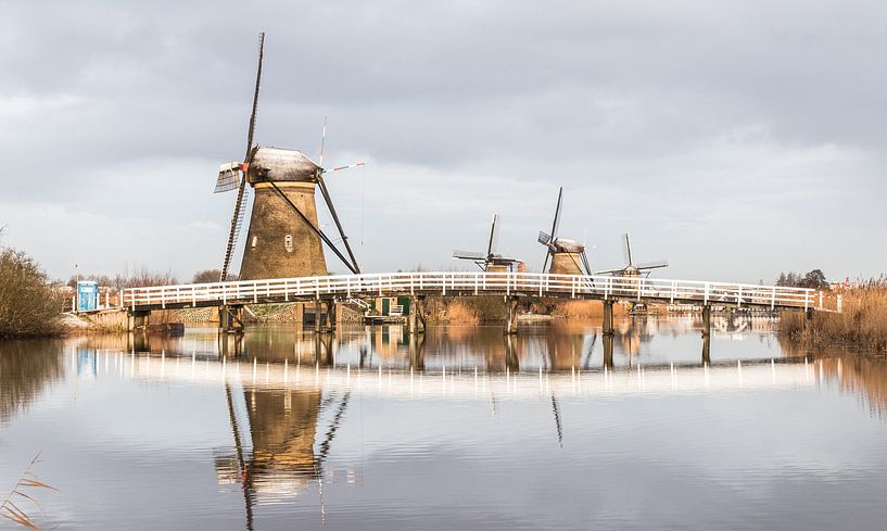 The beautiful windmills of Kinderdijk in winter. It just snowed here. by Claudio Duarte