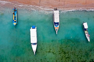 Aerial view of traditional fishing boats on Bali, Indonesia by Eye on You