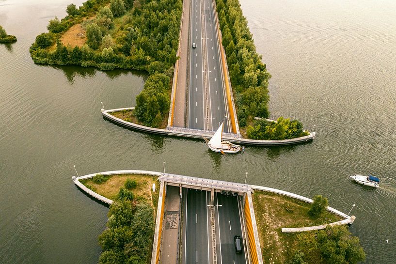 Aqueduct Veluwemeer in the Veluwe lake with a boat sailing in th by Sjoerd van der Wal Photography