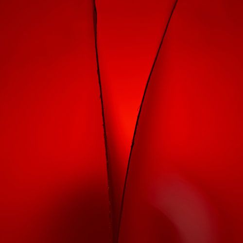 Gevouwen papier in rood licht