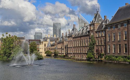 The Binnenhof parliament buildings and fountain on the Hofvijver pond in The Hague, Holland by Jan Kranendonk