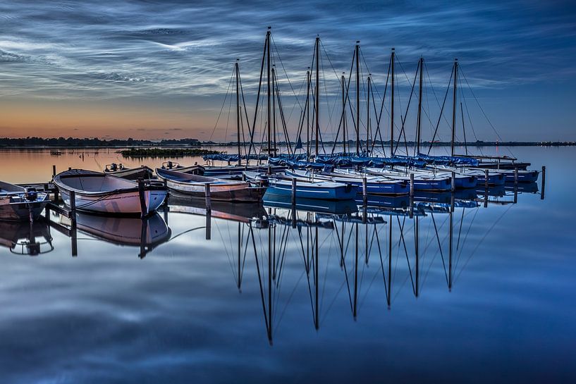 luminous night clouds, noctilucent clouds, refelcting, weather epiglottes, water, lake, sailboat by Karin Broekhuijsen