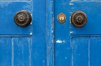 Blue wooden door in Lisbon, Portugal