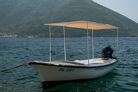 Traditional fishing boat in the Bay of Kotor near Perast by Bram Tempelaar Photography