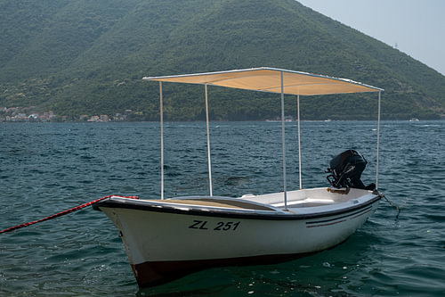 Traditional fishing boat in the Bay of Kotor near Perast