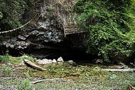 Secret entrance to the grotto of the hidden Buddhas by Frank Photos