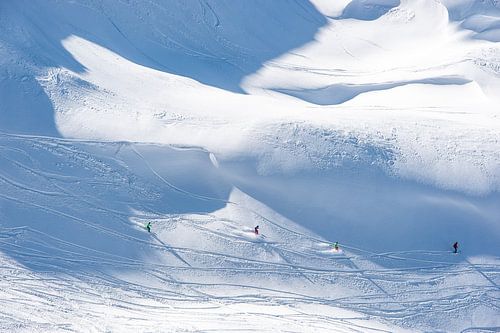 Skiers descend from the Titlis