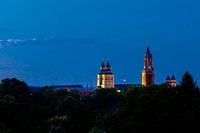 Blue hour over Maastricht with the church towers of Sint Servaas and Sint Jan.