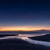 Zonsondergang vanaf het strand in Zeeland bij Vrouwenpolder van Judith Borremans Natuurfotografie