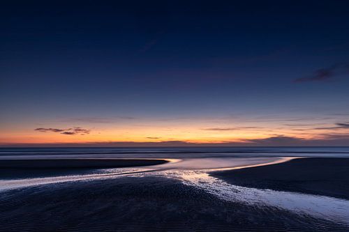 Sonnenuntergang vom Strand in Zeeland bei Vrouwenpolder